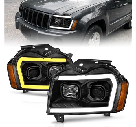 ANZO 2005-2007 Jeep Grand Cherokee Projector Headlights w/ Light Bar Switchback Black Housing
