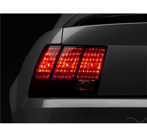 Raxiom 99-04 Ford Mustang Excluding 99-01 Cobra Tail Lights- Black Housing (Smoked Lens)