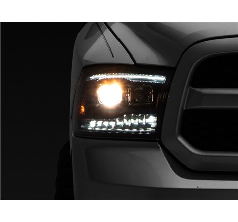 Raxiom 09-18 RAM 1500 LED Projector Headlights w/ Switchback Turn Signals- Blk Housing (Clear Lens)