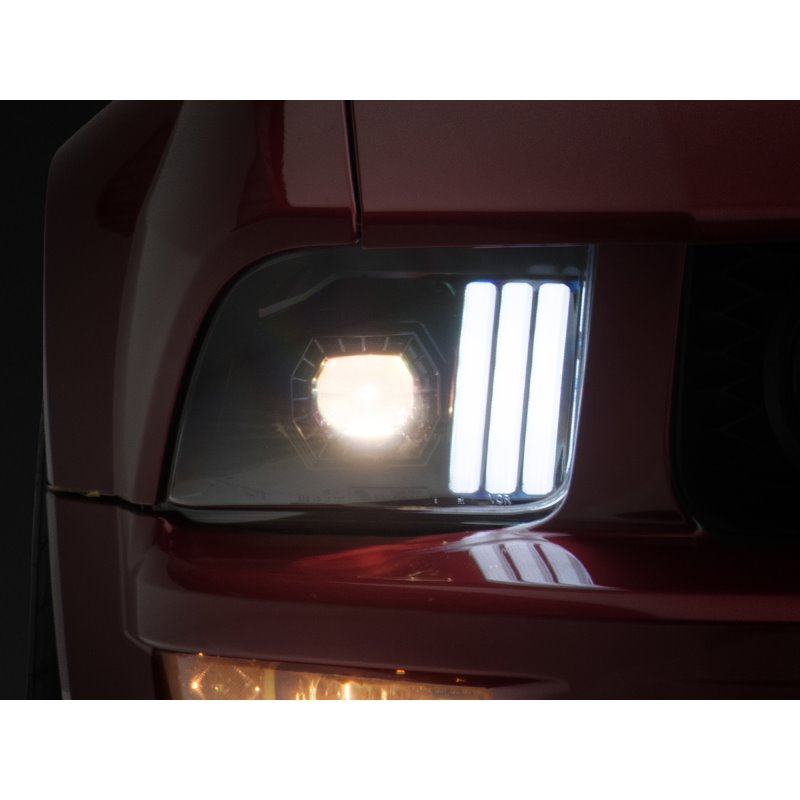 Raxiom 05-09 Ford Mustang w/ Halogen Prjctor Headlights- Black Housing (Clear Lens) (No GT500 )