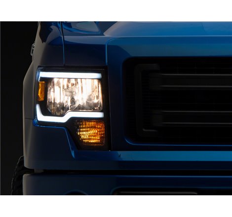 Raxiom 09-14 Ford F-150 Axial Series Headlights w/ LED Bar- Blk Housing (Clear Lens)