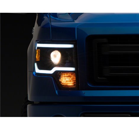 Raxiom 09-14 Ford F-150 Axial Series Projector Headlights w/ LED Light Bar- Blk Housing (Clear Lens)