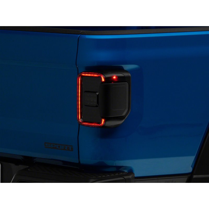 Raxiom 20-23 Jeep Gladiator JT w/ Factory Halogen LED Tail Lights- Blk Housing (Smoked Lens)